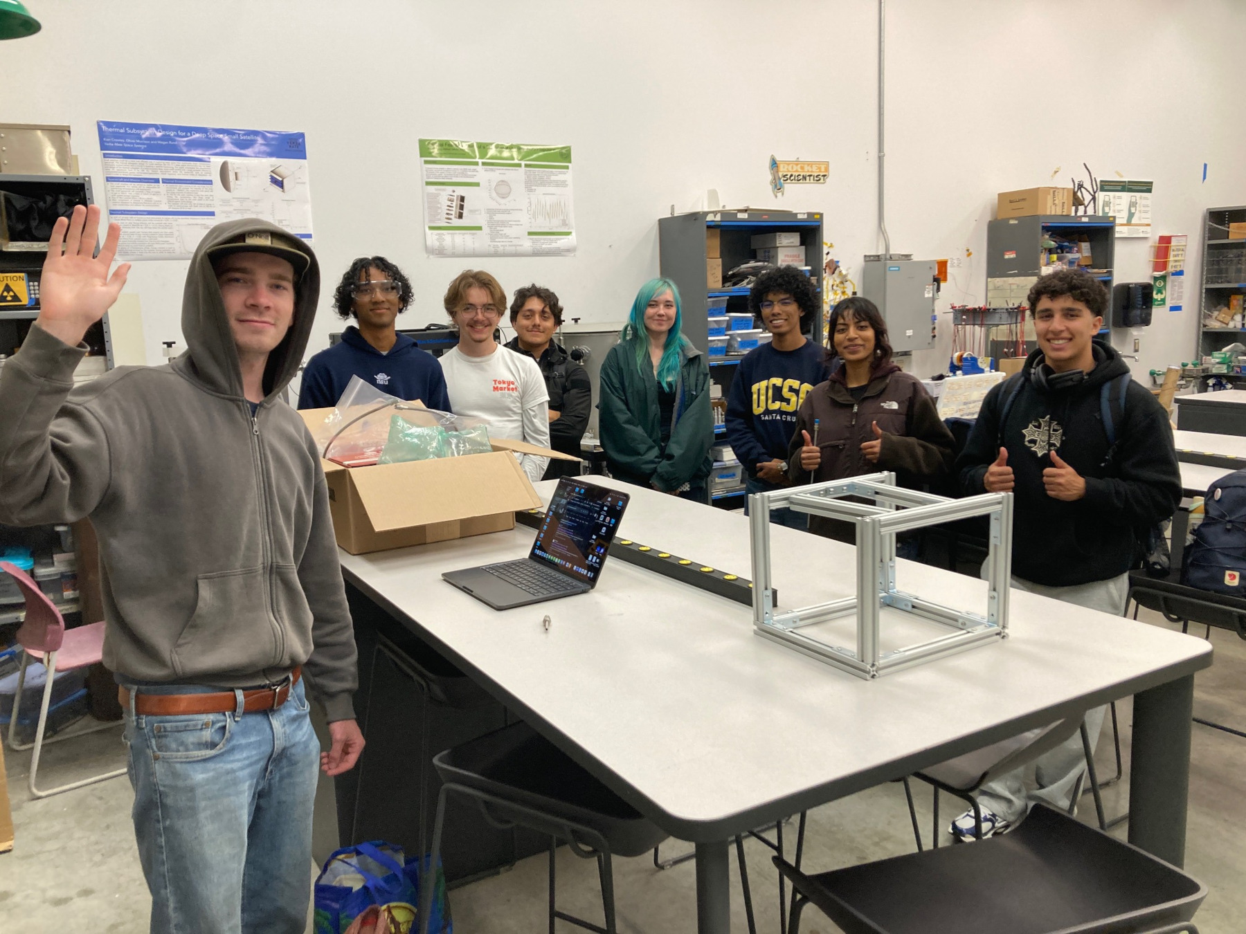 photograph of PEPPR students in the space environments lab